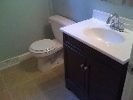 Downstairs bathroom with tile floor